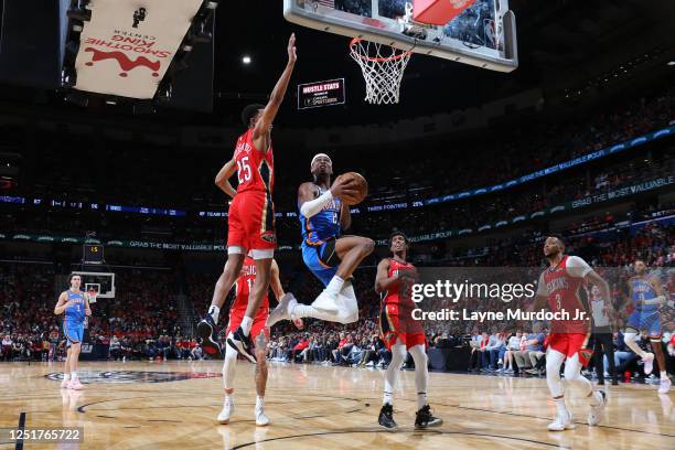 Shai Gilgeous-Alexander of the Oklahoma City Thunder drives to the basket during the game against the New Orleans Pelicans during the 2023 Play-In...