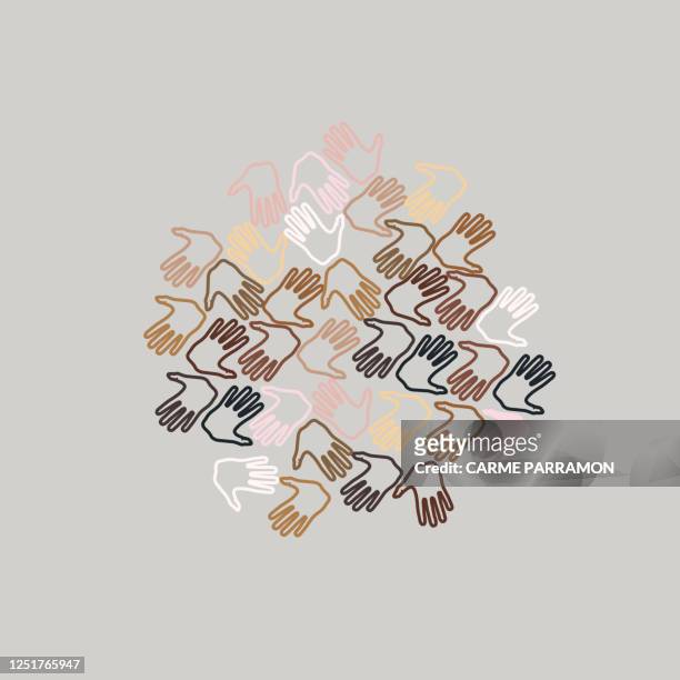 multi ethnic world. love and skin tones in a hand - diversity concepts stock illustrations
