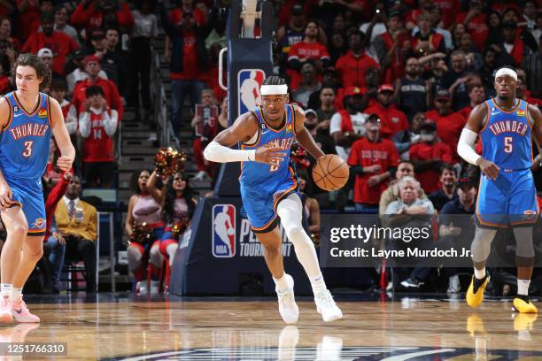 Shai Gilgeous-Alexander of the Oklahoma City Thunder drives to the basket during the game against the New Orleans Pelicans during the 2023 Play-In...