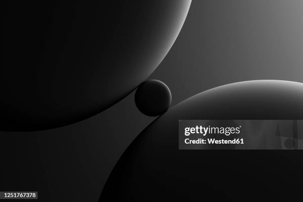 glass spheres and dramatic lighting over dark grey background, 3d illustration - steady stock pictures, royalty-free photos & images