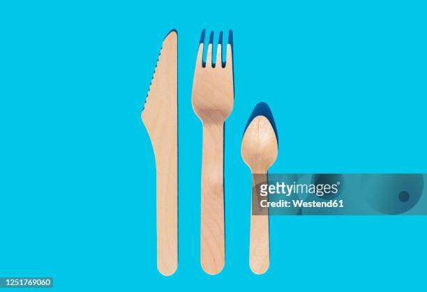wooden cutlery, fork, knife and spoon to take away organic and ecological zero waste - silverware fotografías e imágenes de stock