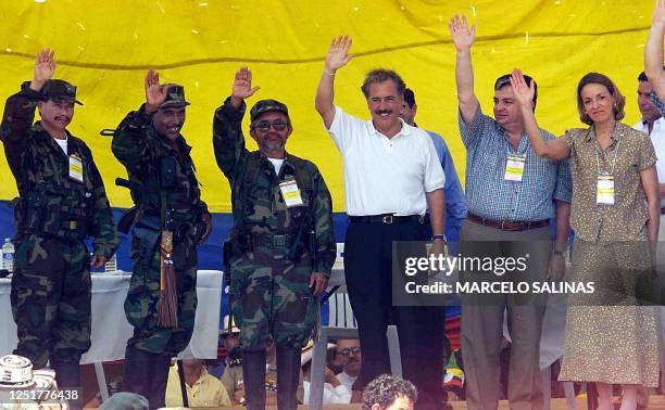 Revolutionary Armed Forces of Colombia leaders Fabian, Joaquin, Raul Reyes, and Colombian President Andres Pastrana , President of Congress Fabio...