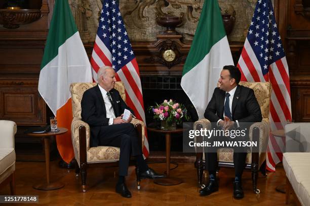 President Joe Biden speaks with Ireland's Prime minister Leo Varadkar at Farmleigh House, in Dublin on April 13 during his four day trip to Northern...