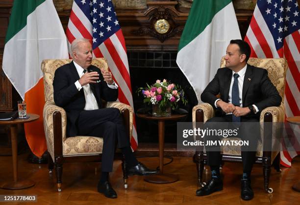 President Joe Biden speaks with Ireland's Prime minister Leo Varadkar at Farmleigh House, in Dublin on April 13 during his four day trip to Northern...