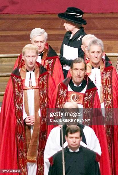 Queen Elizabeth II leaves St. Pauls Cathedral in sombre mood 14 September 2001, after a special hour long service to honour the victims of Tuesdays...