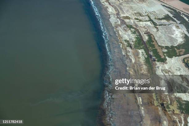 Receding shoreline at the Salton Sea on Tuesday, April 4, 2023 in Coachella Valley, CA. The Salton Sea is a shallow, landlocked, highly saline body...