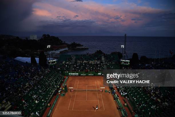 General view of the venue shows Russia's Daniil Medvedev playing against Germany's Alexander Zverev after the rain during their Monte Carlo ATP...
