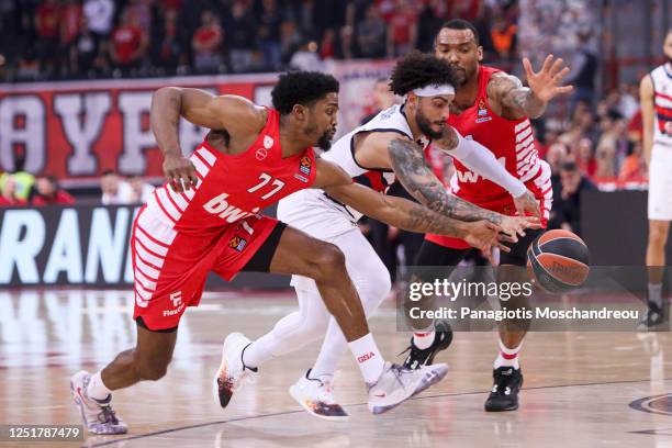 Shaquielle McKissic, #77 of Olympiacos Piraeus competes with Markus Howard, #0 of Cazoo Baskonia Vitoria Gasteiz during the 2022-23 Turkish Airlines...