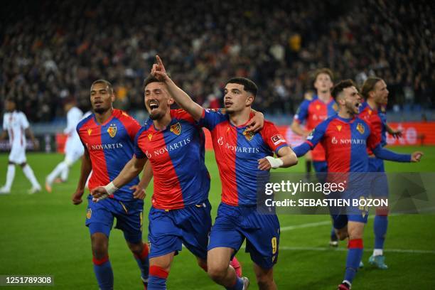 Basel's Swiss forward Zeki Amdouni celebrates with teammates after scoring from the penalty spot during the UEFA Europa Conference League Quater...