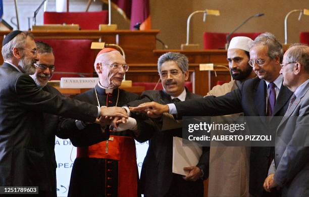 Rome's Chief Rabbi Riccardo Di Segni, founder of the Community of Sant'Egidio Andrea Riccardi, Vatican cardinal Paul Poupard, head of the Pontifical...