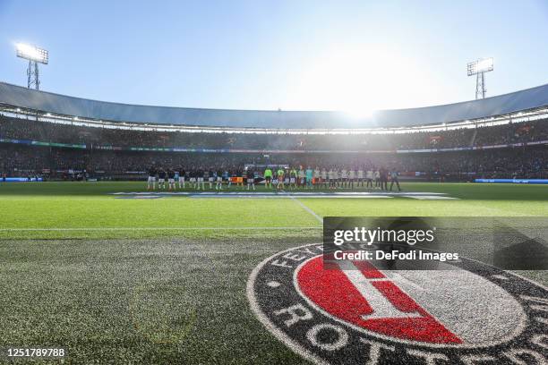 Players line up before the match prior to the UEFA Europa League quarterfinal first leg match between Feyenoord and AS Roma at Feyenoord Stadium on...
