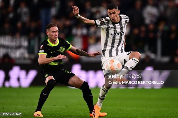 Sporting CP's Portuguese forward Nuno Santos and Juventus' Argentinian forward Angel Di Maria go for the ball during the UEFA Europa League...