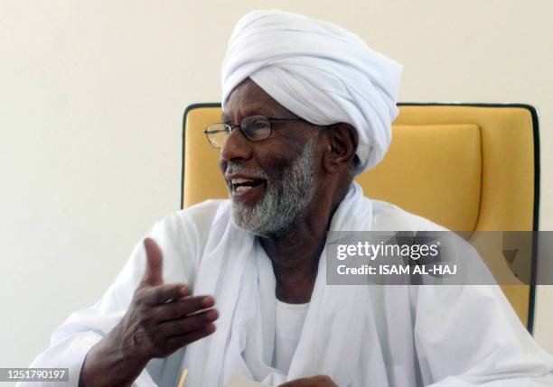 Sudanese opposition Islamic leader Hassan al-Turabi talks during an interview 04 June 2006 in Khartoum. Turabi said he has no problem with Sudan's...