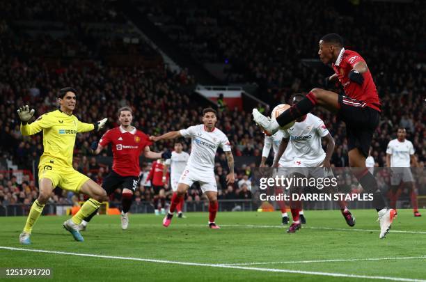 Manchester United's French striker Anthony Martial shoots but fails to score during the UEFA Europa league quarter-final, first leg football match...