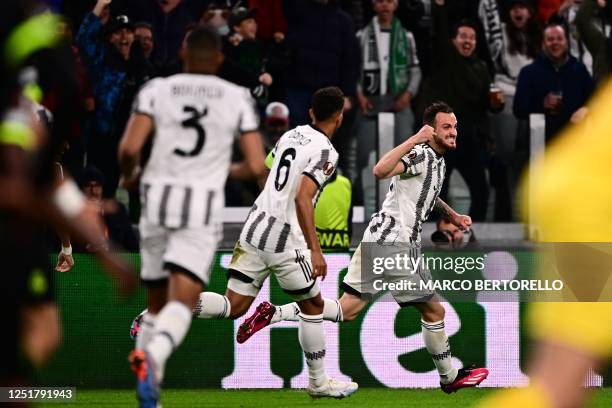 Juventus' Italian defender Federico Gatti celebrates after opening the scoring during the UEFA Europa League quarter-finals first leg football match...