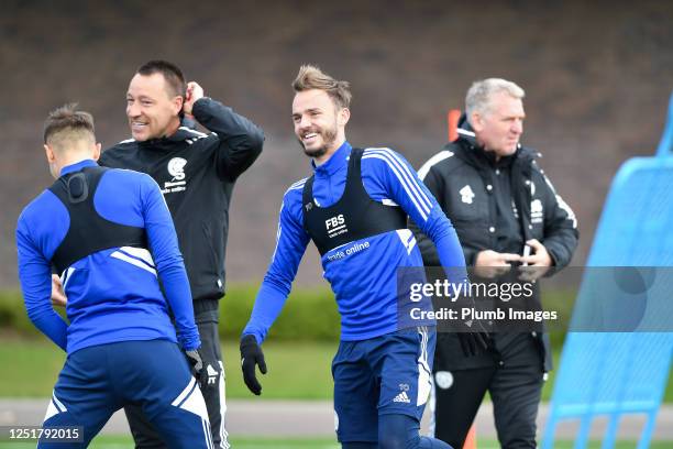 James Maddison of Leicester City with John Terry first team coach, Luke Thomas of Leicester City and Leicester City manager Dean Smith during the...