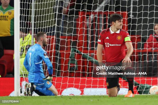 Harry Maguire of Manchester United reacts after scoring an own goal to make it 2-2 during the UEFA Europa League quarterfinal first leg match between...