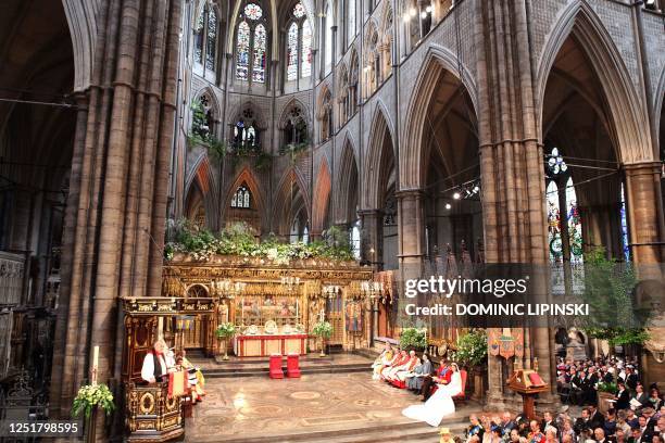 Reverend Richard Chartres, Lord Bishop of London reads from the pulpit at Westminster Abbey during the royal wedding of Prince William and Kate...