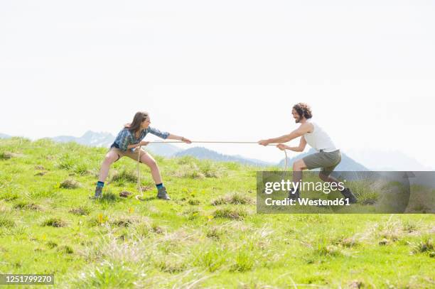 Pulling Rope Load 929 Two Men Pulling A Rope Stock Photos, High-Res Pictures, and Images ...