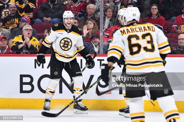 Jake DeBrusk of the Boston Bruins celebrates his goal during the first period against the Montreal Canadiens at Centre Bell on April 13, 2023 in...