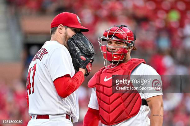 St. Louis Cardinals starting pitcher Jordan Montgomery and St. Louis Cardinals catcher Willson Contreras confer on the mound during a game between...