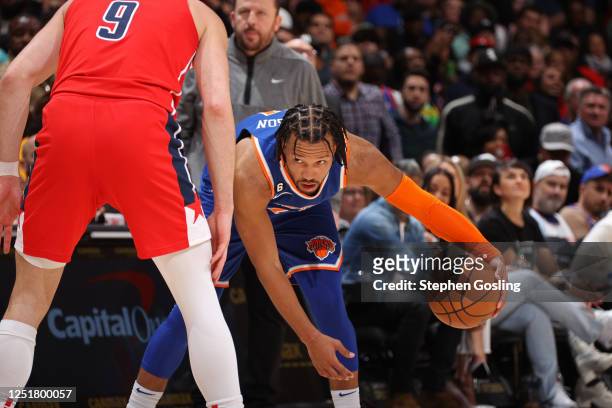 Jalen Brunson of the New York Knicks moves the ball during the game against the Washington Wizards on February 24, 2023 at Capital One Arena in...