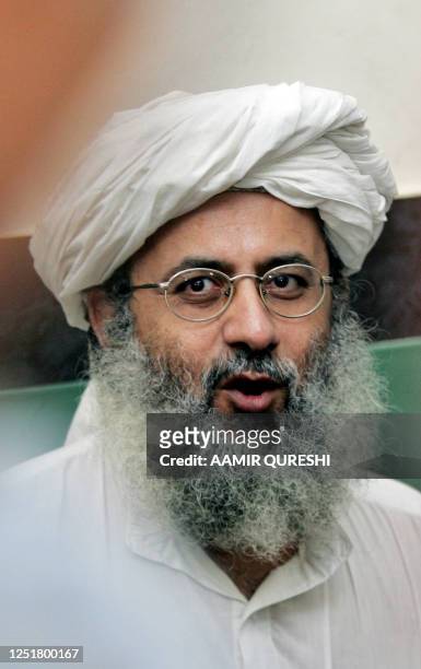 Abdul Rashid Ghazi, deputy head of the Red Mosque gestures as he announces the release of Chinese hostages during a press conference in Islamabad, 23...