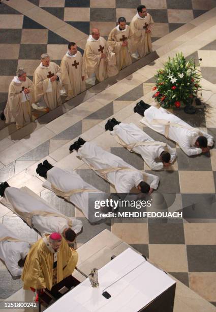 Paris archbishop Andre Vingt-Trois celebrates a mass for the ordinance of twelve new priests , 23 June 2007 at Notre-Dame de Paris cathedral in the...
