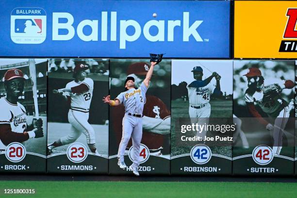 Connor Joe of the Pittsburgh Pirates catches a fly ball by the St. Louis Cardinals in the first inning at Busch Stadium on April 13, 2023 in St...