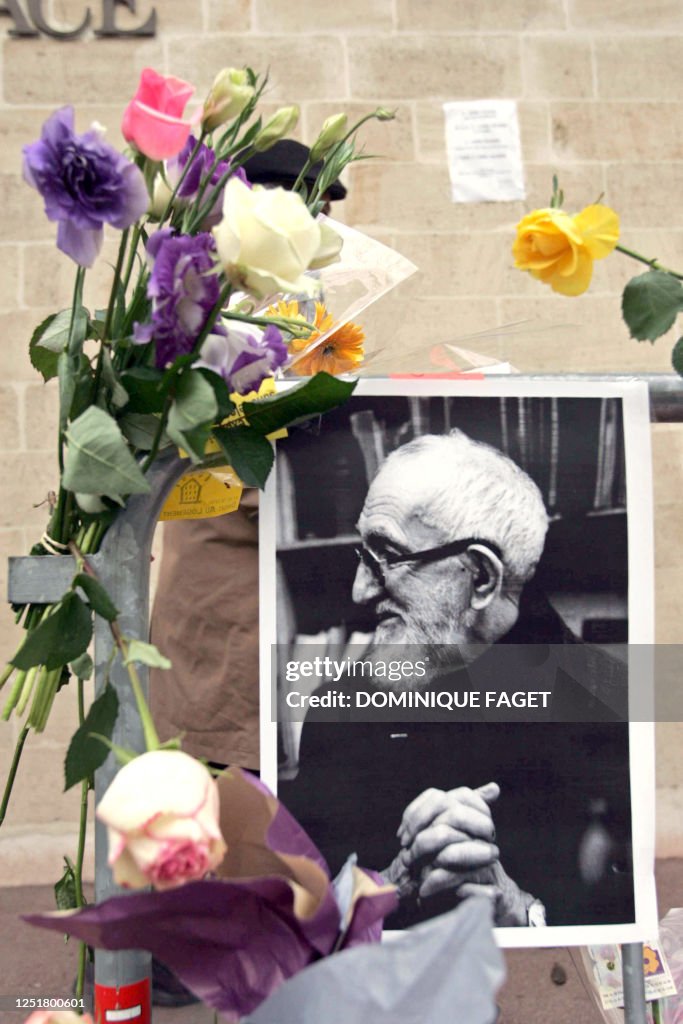 A picture portrait of Emmaus' founder l'abbe Pierre, is put as a ...