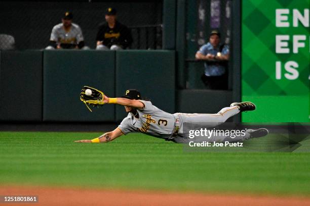 Ji Hwan Bae of the Pittsburgh Pirates catches a fly ball by the St. Louis Cardinals in the fifth inning at Busch Stadium on April 13, 2023 in St...