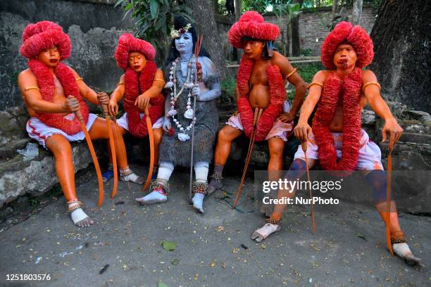 Hindu devotees rest during a festival called Lal Kach on the last day of the Bangla month in Munshigonj, Dhaka, Bangladesh on Thursday, April 13,...