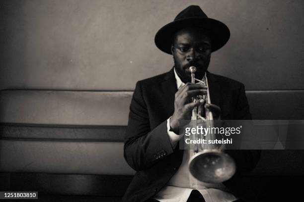 the trumpet player - black and white stock pictures, royalty-free photos & images