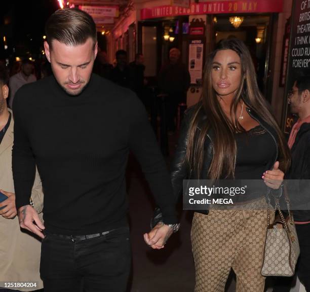 Carl Woods and Katie Price are seen leaving the Ambassadors theatre in on April 14, 2023 in London, United Kingdom.