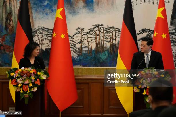 German Foreign Minister Annalena Baerbock and Chinese Foreign Minister Qin Gang attend a joint press conference at the Diaoyutai State Guesthouse on...