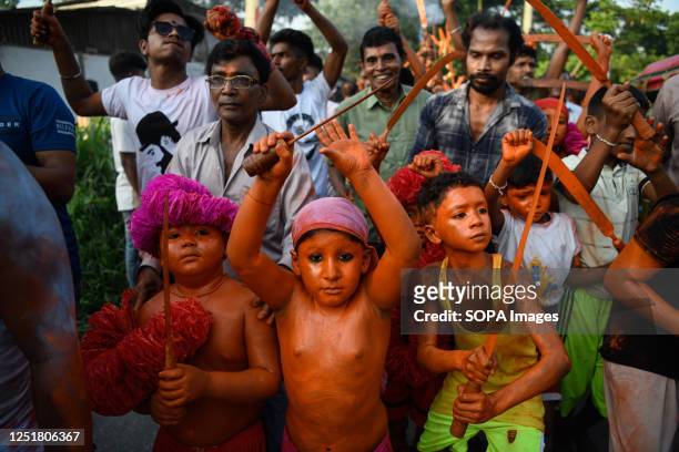 Hindu children dance as they take part in a festival called Lal Kach during the last day of the Bangla month in Munshigonj outskirt of Dhaka. The...