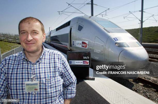 Eric Pieczac, France's V150 TGV fast train's driver poses 02 April 2007 on the plateform at the "Reims Bezannes" station, on the eve of an attempt to...