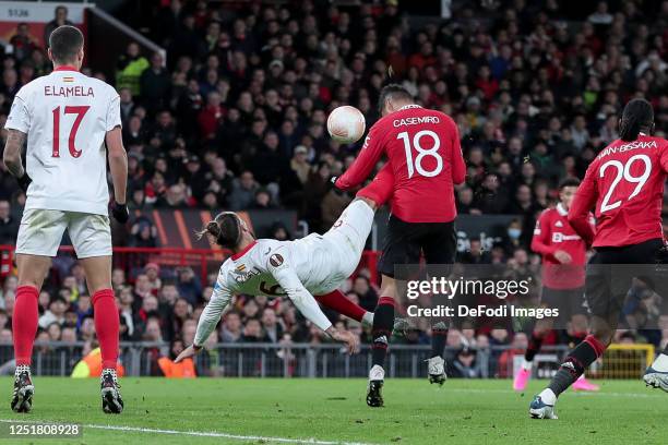 Nemanja Gudelj of Sevilla FC and Casemiro of Manchester United battle for the ball during the UEFA Europa League quarterfinal first leg match between...