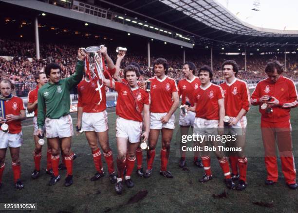 Nottingham Forest players celebrate with the trophy on their lap of honour after the Football League Cup final between Nottingham Forest and...