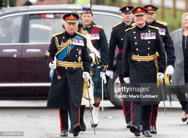 King Charles III inspects the 200th Royal Military Academy Sandhurst's Sovereign's Parade, presenting the new Colours and Sovereign's Banner to the...