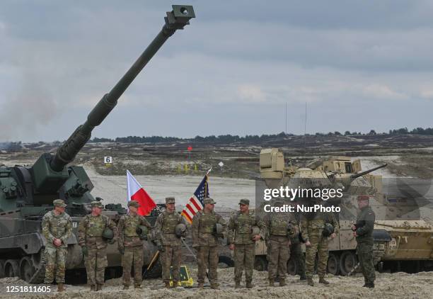 Polish and US soldiers at the end of a military training session at Nowa Deba training ground, in Nowa Deba, Poland, on April 12 2023. US and Polish...