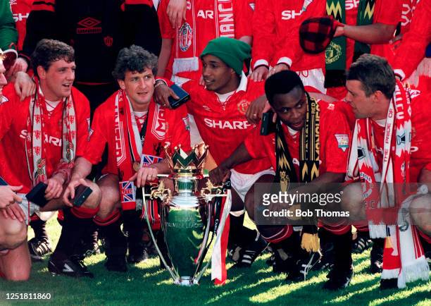 Manchester United line up for a group photo as they celebrate with the League trophy following the presentation after the FA Carling Premiership...