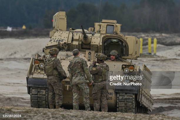 Soldiers from 2nd Battalion, 70th Armor Regiment, 1st Infantry Division train with Bradley Fighting Vehicles at Nowa Deba, in Nowa Deba, Poland, on...