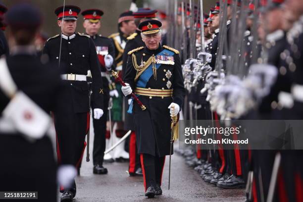 King Charles III inspects the 200th Sovereign's parade at Royal Military Academy Sandhurst on April 14, 2023 in Camberley, England. The parade marks...