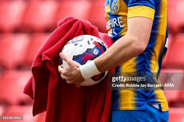 Luke Leahy of Shrewsbury Town dries an EFL mitre match ball with a red towel during the Sky Bet League One between Barnsley and Shrewsbury Town at...