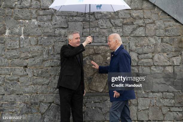 In this handout image provided by the Irish Government, US President Joe Biden visits Knock Shrine and Basilica with Fr. Richard Gibbons and touched...