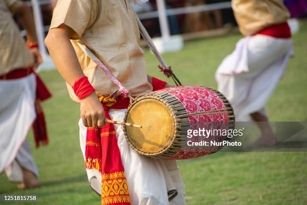 Men in traditional attire perform Bihu dance, as they celebrates Rongali Bihu festival organized by All Assam Students Union , at Judge Field in...