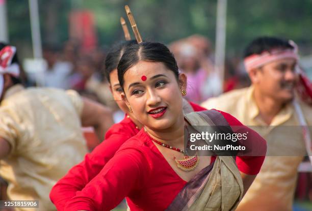 Young women in traditional Mekhela Chadar perform Bihu dance, as they celebrates Rongali Bihu festival organized by All Assam Students Union , at...