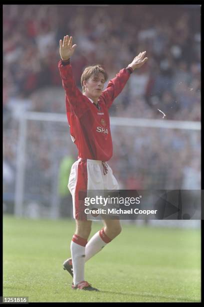 David Beckham of Manchester United in action during the Premier League match between Wimbledon and Manchester United at Selhurst Park in London....