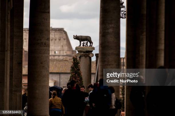 View of the Capitoline Wolf Column, Piazza del Campidoglio, with tourists on April 14, 2023 in Rome, Italy.